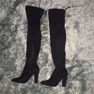 Thigh high black suede boots